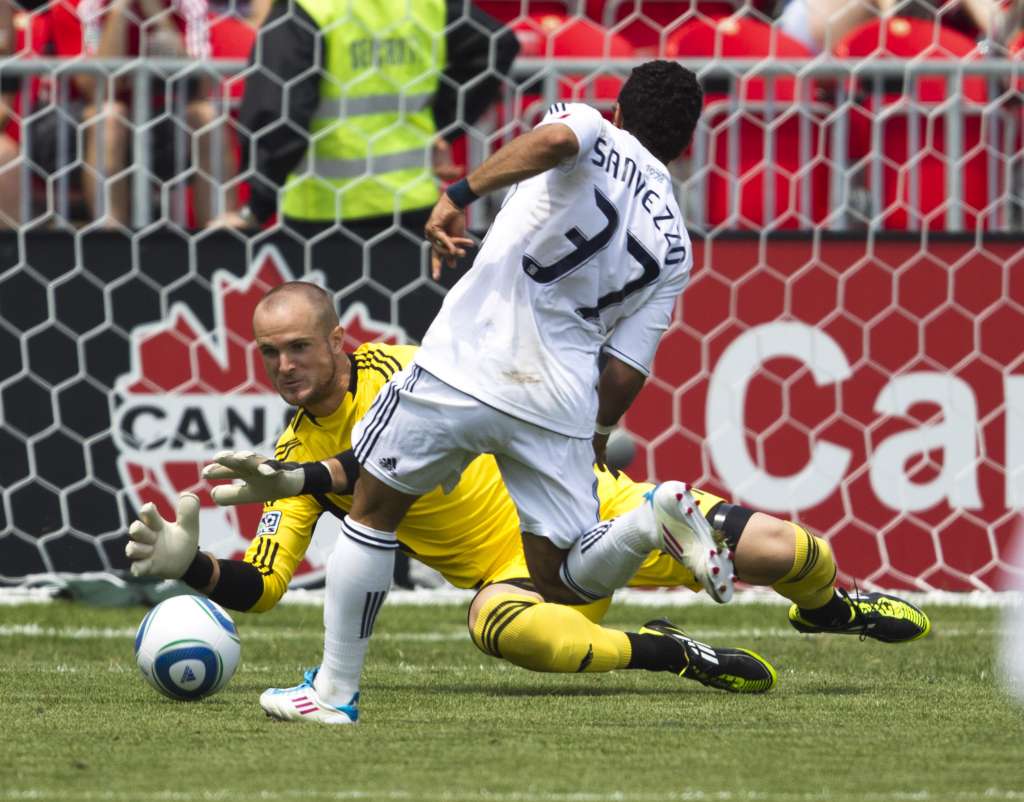 TFC keeper Stefan Frei stretches to get to shot from Camilo. PHOTO: PAUL GIAMOU/CANADA SOCCER
